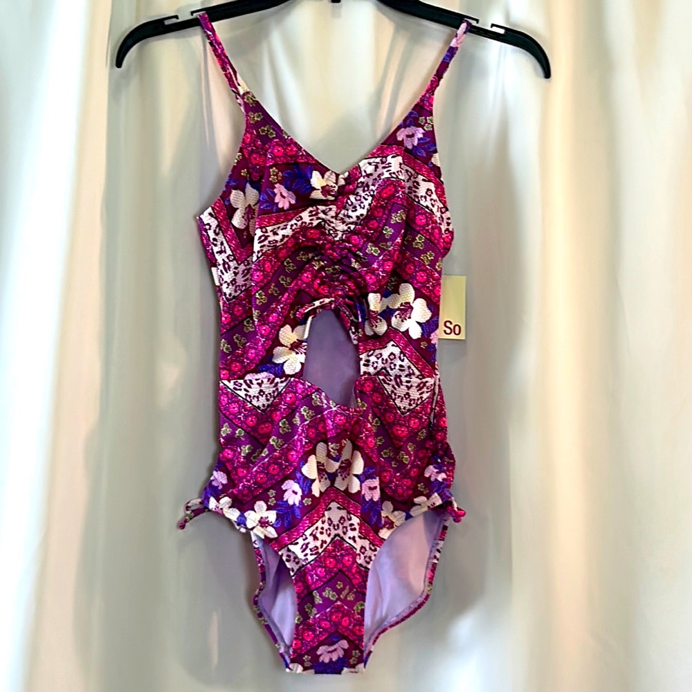 NWT size 16 for child, UV protection, built in multicolor one piece suit
